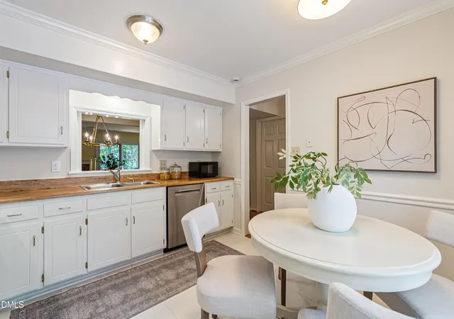 Photo 3 of Townhouse for sale at 1523 Woodcroft Dr, Raleigh, NC 27609 | MLS# 10192088 | Listing updated on 2026-09-14