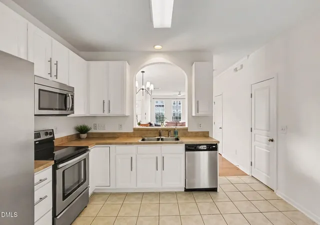 Photo 4 of Townhouse for sale at 7640 Winners Edge St, Raleigh, NC 27617 | MLS# 10191903 | Listing updated on 2026-09-11
