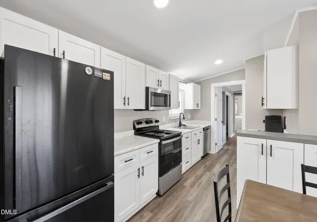 Photo 3 of Manufactured home for sale at 2001 Auburn Rd, Raleigh, NC 27610 | MLS# 10191294 | Listing updated on 2026-10-02