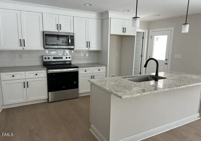 Photo 3 of Single family home for sale at 299 S Main St, Four Oaks, NC 27524 | MLS# 10191915 | Listing updated on 2026-09-11