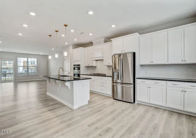 Photo 3 of Townhouse for sale at 2804 Austin Fls Sta, Apex, NC 27502 | MLS# 10191547 | Listing updated on 2026-10-04