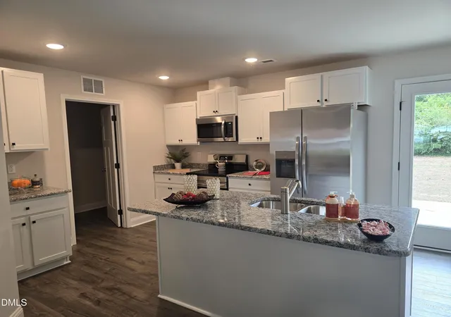 Photo 3 of Single family home for sale at 1209 Tarboro St, Rocky Mount, NC 27801 | MLS# 10191796 | Listing updated on 2026-09-10
