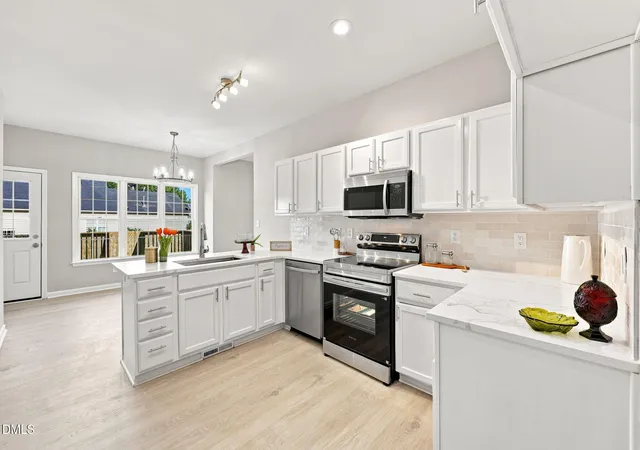 Photo 2 of Single family home for sale at 8616 Wild Wood Forest Dr, Raleigh, NC 27616 | MLS# 10192057 | Listing updated on 2026-09-11
