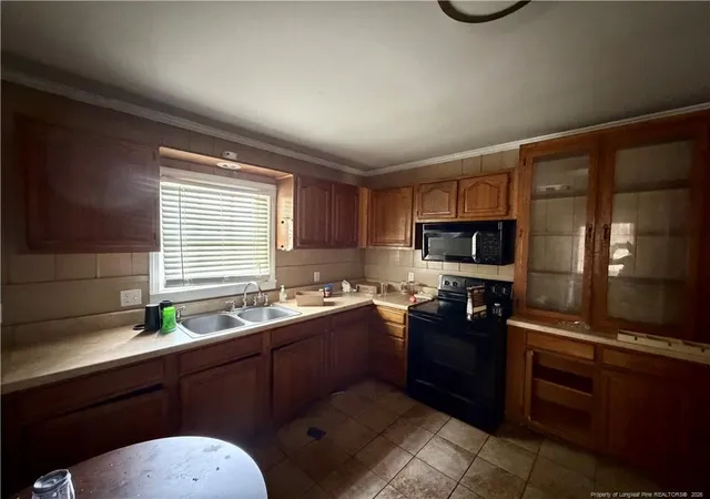 Photo 2 of Single family home for sale at 209 S Patterson St, Maxton, NC 28364 | MLS# 769251 | Listing updated on 2026-09-12
