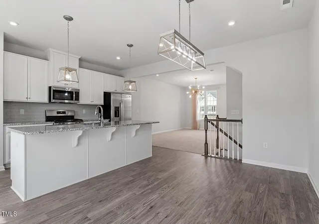 Photo 3 of Townhouse for sale at 513 Citrus Petal Rd, Fuquay Varina, NC 27526 | MLS# 10193376 | Listing updated on 2026-10-01