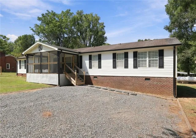 Photo 2 of Single family home for sale at 1437 Deep River, Sanford, NC 27330 | MLS# 769471 | Listing updated on 2026-10-05
