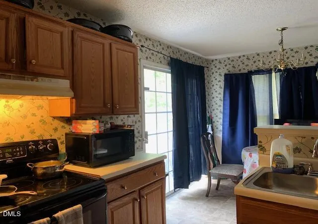 Photo 3 of Single family home for sale at 104 Scotts Ln, Angier, NC 27501 | MLS# 10193546 | Listing updated on 2026-10-01