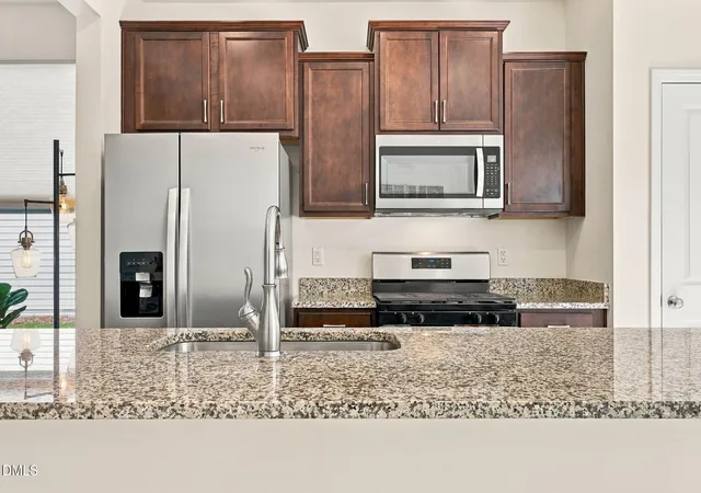 Photo 3 of Townhouse for sale at 717 Ridge Cliff Ln, Zebulon, NC 27597 | MLS# 10193621 | Listing updated on 2026-10-06