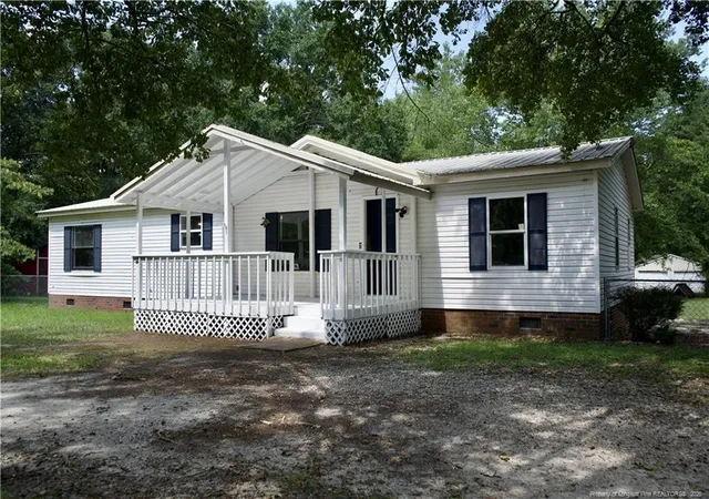 Photo 2 of Manufactured home for sale at 212 Grummen Rd, Hope Mills, NC 28348 | MLS# 769559 | Listing updated on 2026-09-25