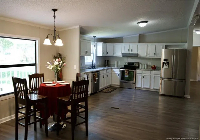 Photo 4 of Manufactured home for sale at 212 Grummen Rd, Hope Mills, NC 28348 | MLS# 769559 | Listing updated on 2026-09-25