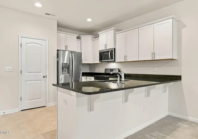 Photo 4 of Townhouse for sale at 1432 Elk Fls Dr, Wendell, NC 27591 | MLS# 10194415 | Listing updated on 2026-10-07