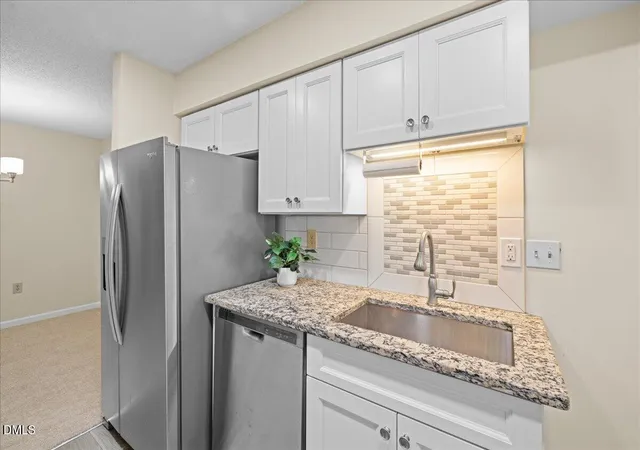 Listing Photo 1 - Condo for sale in building located at 1301 Hillbrow Ln, Raleigh, NC 27615 - Unit #203