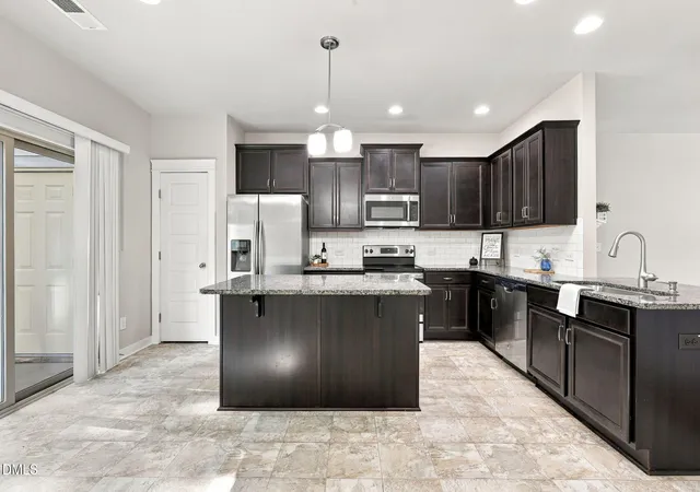 Photo 4 of Townhouse for sale at 6253 Pesta Ct, Raleigh, NC 27612 | MLS# 10194500 | Listing updated on 2026-09-24