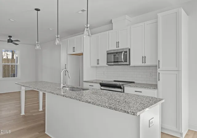 Photo 3 of Townhouse for sale at 4820 Gossamer Ln #102, Raleigh, NC 27616 | MLS# 10194430 | Listing updated on 2026-09-23