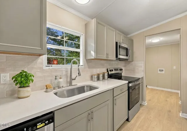 Photo 2 of Manufactured home for sale at 302 Vass Rd, Spring Lake, NC 28390 | MLS# 10196092 | Listing updated on 2026-10-03