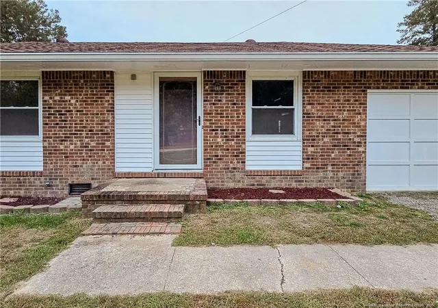 Photo 2 of Single family home for sale at 215 Lakeview Dr, Spring Lake, NC 28390 | MLS# 770836 | Listing updated on 2026-10-27