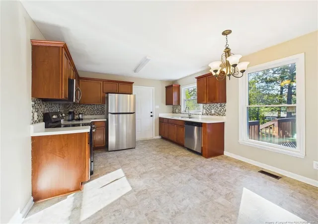 Photo 4 of Single family home for sale at 228 Eppingdale Dr, Spring Lake, NC 28390 | MLS# 770948 | Listing updated on 2026-10-14