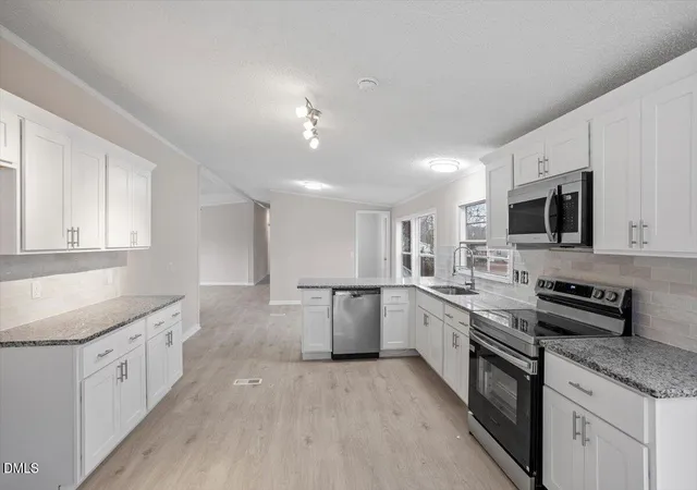Photo 2 of Manufactured home for sale at 217 Mckay Dr, Spring Lake, NC 28390 | MLS# 10198772 | Listing updated on 2026-10-16