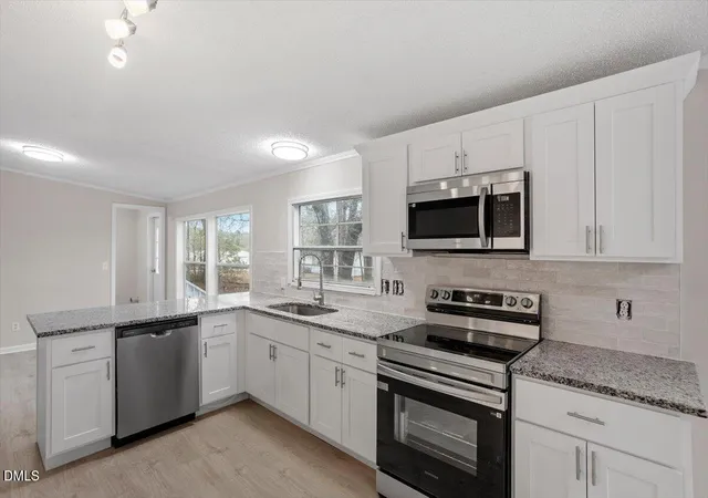 Photo 3 of Manufactured home for sale at 217 Mckay Dr, Spring Lake, NC 28390 | MLS# 10198772 | Listing updated on 2026-10-16