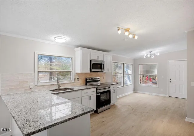 Photo 4 of Manufactured home for sale at 217 Mckay Dr, Spring Lake, NC 28390 | MLS# 10198772 | Listing updated on 2026-10-16
