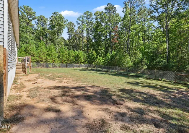 Photo 4 of House for sale at 719 Poole Rd E, New Hill, NC 27562 | MLS# 10199918 | Listing updated on 2026-10-25