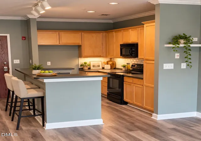 Listing Photo 1 - Condo for sale in building located at 411 W Washington St, Greensboro, NC 27401 - Unit #108