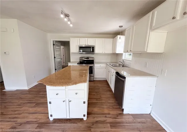 Photo 2 of Single family home for sale at 4982 Follansbee Rd, Winston Salem, NC 27127 | MLS# 1237166 | Listing updated on 2026-10-28