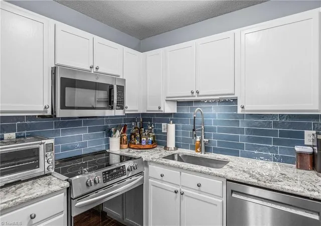 Photo 1 of Single family home for sale at 1905 Crest Holw Dr #102, Winston Salem, NC 27127 | MLS# 1235046 | Listing updated on 2026-09-11