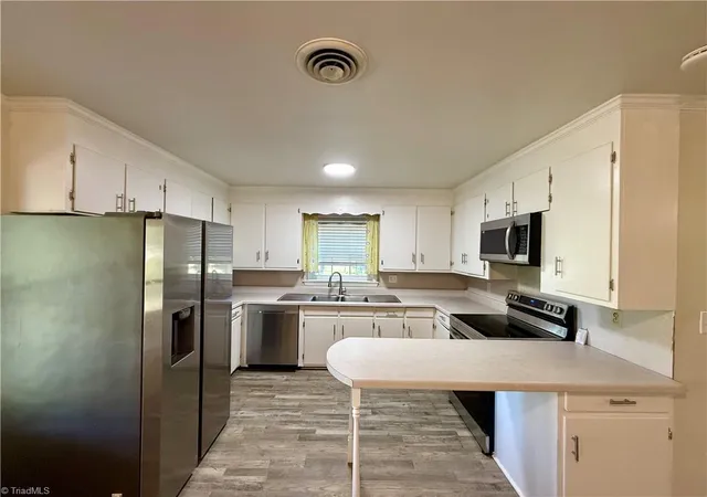 Photo 2 of Single family home for sale at 316 Old Holw Rd, Winston Salem, NC 27105 | MLS# 1234532 | Listing updated on 2026-09-13