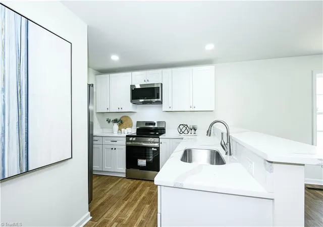 Photo 3 of Single family home for sale at 801 Bellevue St #A, Greensboro, NC 27406 | MLS# 1239947 | Listing updated on 2026-10-25