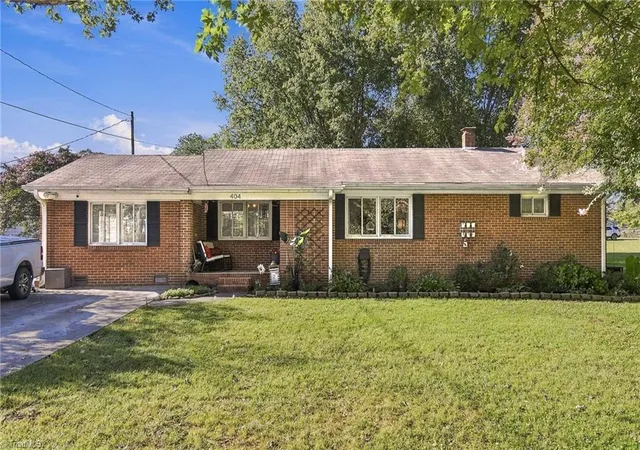 Photo 1 of Single family home for sale at 404 Poplar Cir, Yadkinville, NC 27055 | MLS# 1235689 | Listing updated on 2026-10-04