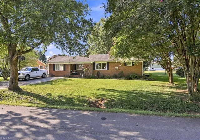 Photo 2 of Single family home for sale at 404 Poplar Cir, Yadkinville, NC 27055 | MLS# 1235689 | Listing updated on 2026-10-04