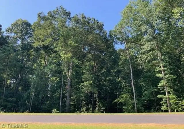 Photo 1 of Land for sale at 7521 Whisper Holw Ln, Lewisville, NC 27023 | MLS# 1233738 | Listing updated on 2026-09-09