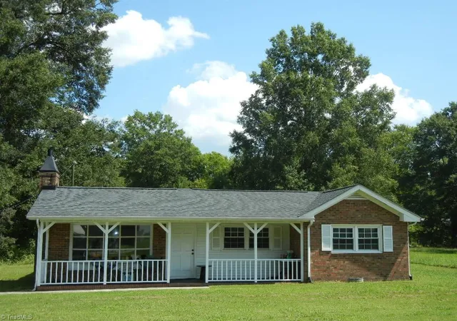 Single family home for sale at 511 Nc Hwy 100, Whitsett, NC 27377 | MLS# 1234432