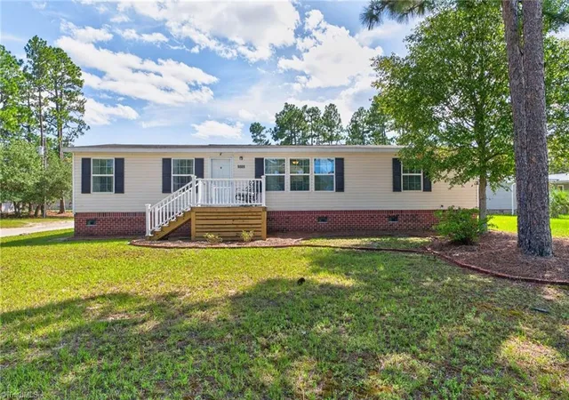 Photo 1 of Manufactured home for sale at 5305 Lakewood Dr, Shallotte, NC 28470 | MLS# 1235158 | Listing updated on 2026-09-10