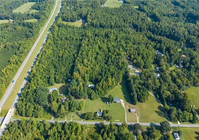 Photo 2 of Single family home for sale at 1056 Sutton Rd, Greensboro, NC 27406 | MLS# 1235826 | Listing updated on 2026-10-01