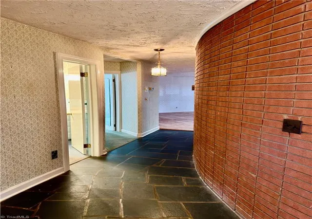 Photo 3 of Single family home for sale at 1031 Country Ln, Winston Salem, NC 27107 | MLS# 1235039 | Listing updated on 2026-09-22
