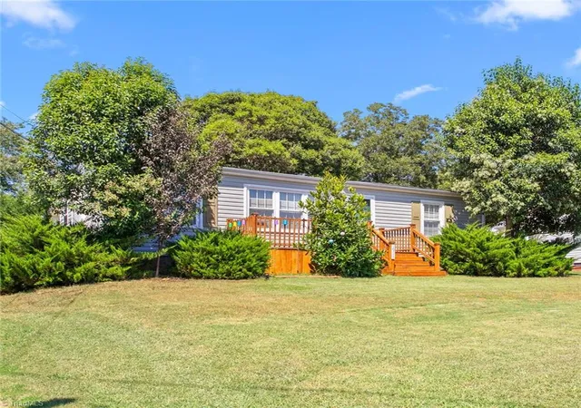 Photo 3 of Single family home for sale at 1911 Tucker St, Burlington, NC 27215 | MLS# 1235448 | Listing updated on 2026-09-14