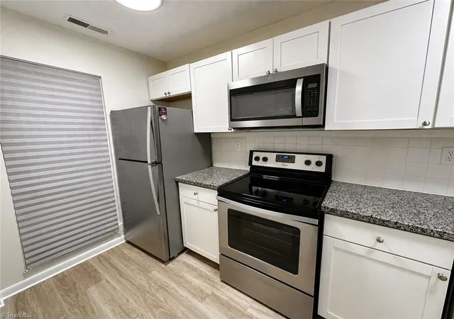 Photo 4 of Single family home for sale at 301 Village Ln #C, Greensboro, NC 27409 | MLS# 1234657 | Listing updated on 2026-09-04