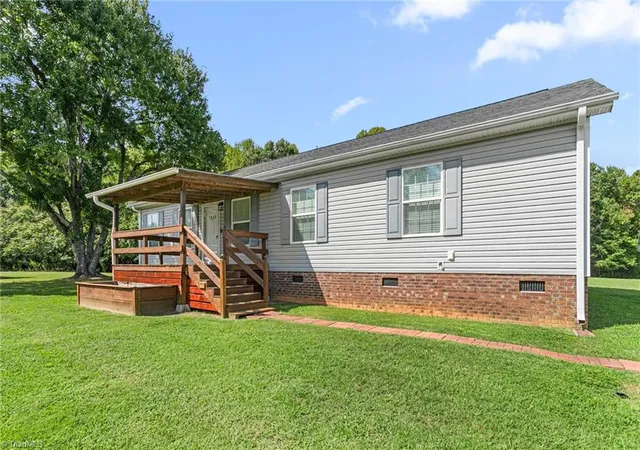 Photo 3 of Manufactured home for sale at 1054 Sutton Rd, Greensboro, NC 27406 | MLS# 1235129 | Listing updated on 2026-09-11