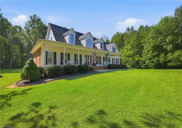 Photo 2 of Single family home for sale at 406 Creek Ml Ct, Greensboro, NC 27406 | MLS# 1234586 | Listing updated on 2026-09-16