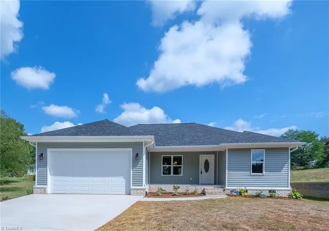 Photo 1 of Single family home for sale at 5705 Marshallgate Dr, Winston Salem, NC 27105 | MLS# 1235430 | Listing updated on 2026-10-01