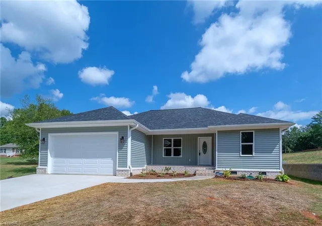 Photo 2 of Single family home for sale at 5705 Marshallgate Dr, Winston Salem, NC 27105 | MLS# 1235430 | Listing updated on 2026-10-01