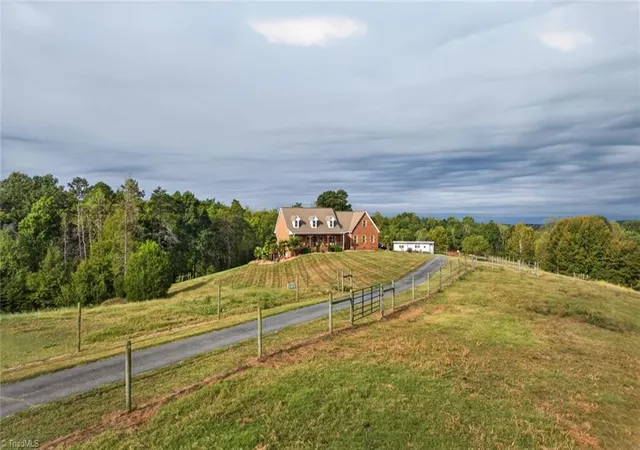 Photo 2 of Single family home for sale at 5734 Ogburn Stables Rd, Tobaccoville, NC 27050 | MLS# 1236413 | Listing updated on 2026-09-22