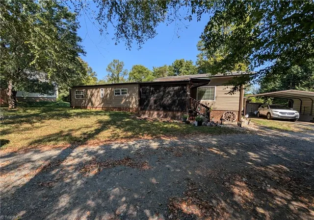 Photo 1 of Manufactured home for sale at 661 Eden Rd, Stoneville, NC 27048 | MLS# 1234678 | Listing updated on 2026-10-07