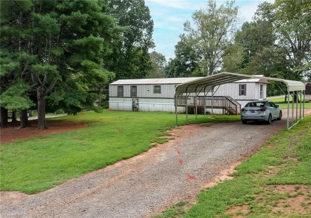 Photo 1 of Manufactured home for sale at 7410 Olin Rd, Pfafftown, NC 27040 | MLS# 1236129 | Listing updated on 2026-09-19