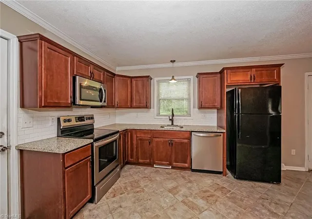 Photo 2 of Single family home for sale at 244 Brookside Dr, Millers Creek, NC 28651 | MLS# 1236004 | Listing updated on 2026-10-07