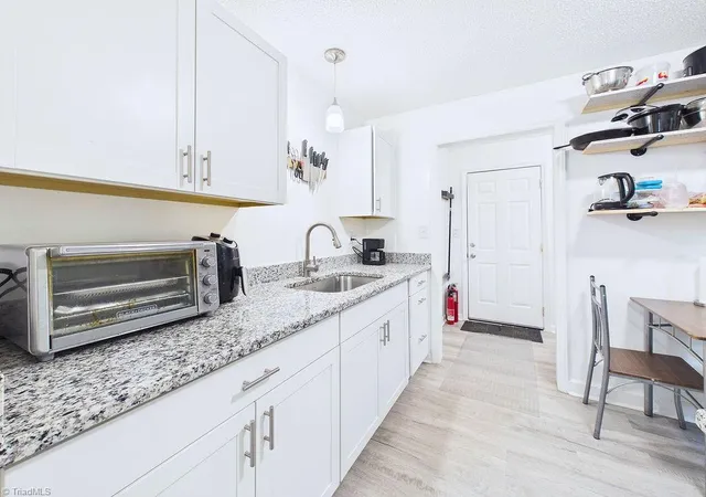 Photo 3 of Single family home for sale at 2911 Dexter Ave, Greensboro, NC 27407 | MLS# 1235003 | Listing updated on 2026-09-10