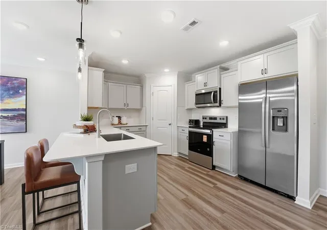 Photo 4 of Single family home for sale at 905 Bear Oak Cir, Gibsonville, NC 27249 | MLS# 1239658 | Listing updated on 2026-10-25