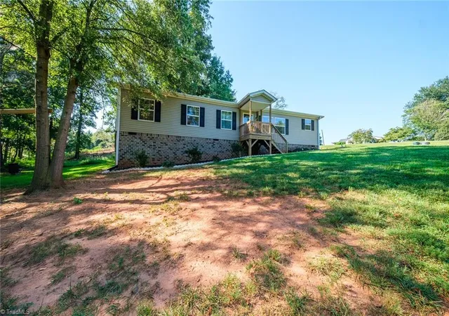 Photo 3 of Manufactured home for sale at 1317 Haire Rd, Yadkinville, NC 27055 | MLS# 1234093 | Listing updated on 2026-09-08